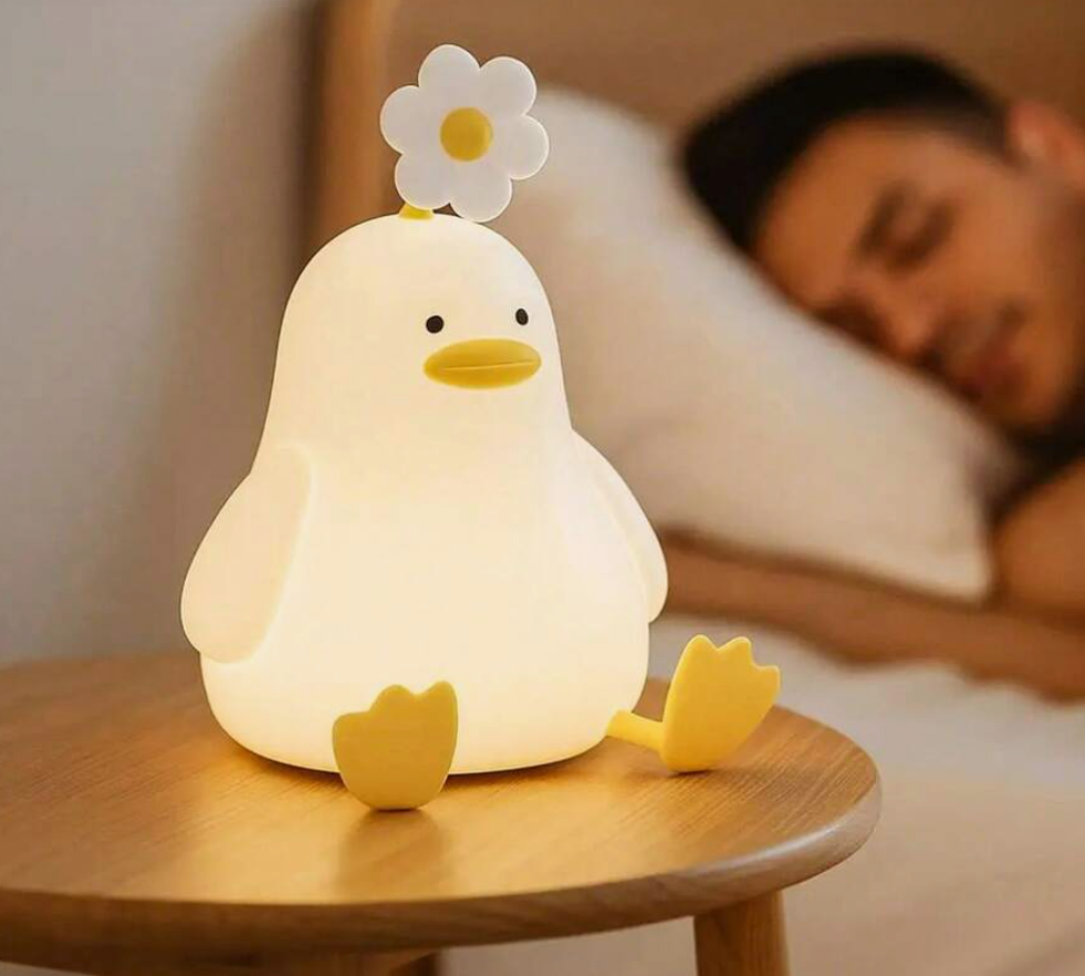 Patito Bloom — Lámpara Suave 2 en 1 con Base de Celu